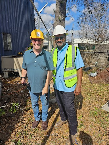Newly installed ADA compliant ramp with professional metal handrails at the HEART facility in Houston.