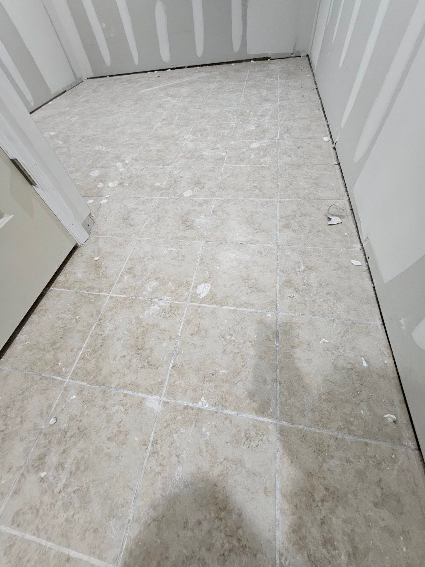 Modern renovated communal area featuring accessible seating and wide, paved pathways for easy navigation.